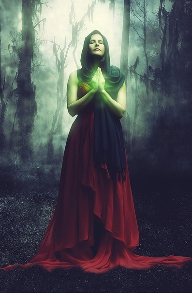 Woman in crimson dress with glowing praying hands in fantasy forest setting by Karen_Nadine via Pixabay
